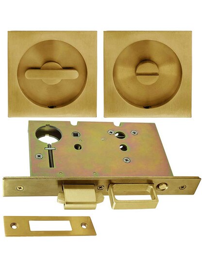 Premium Pocket-Door Mortise Lock Set with Square Pulls in Aged Brass.